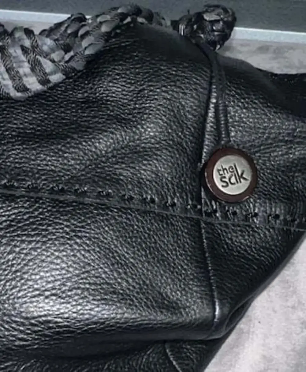 The Sak Black Leather Slouchy Bucket Hobo Shoulder Bag with Braided Strap